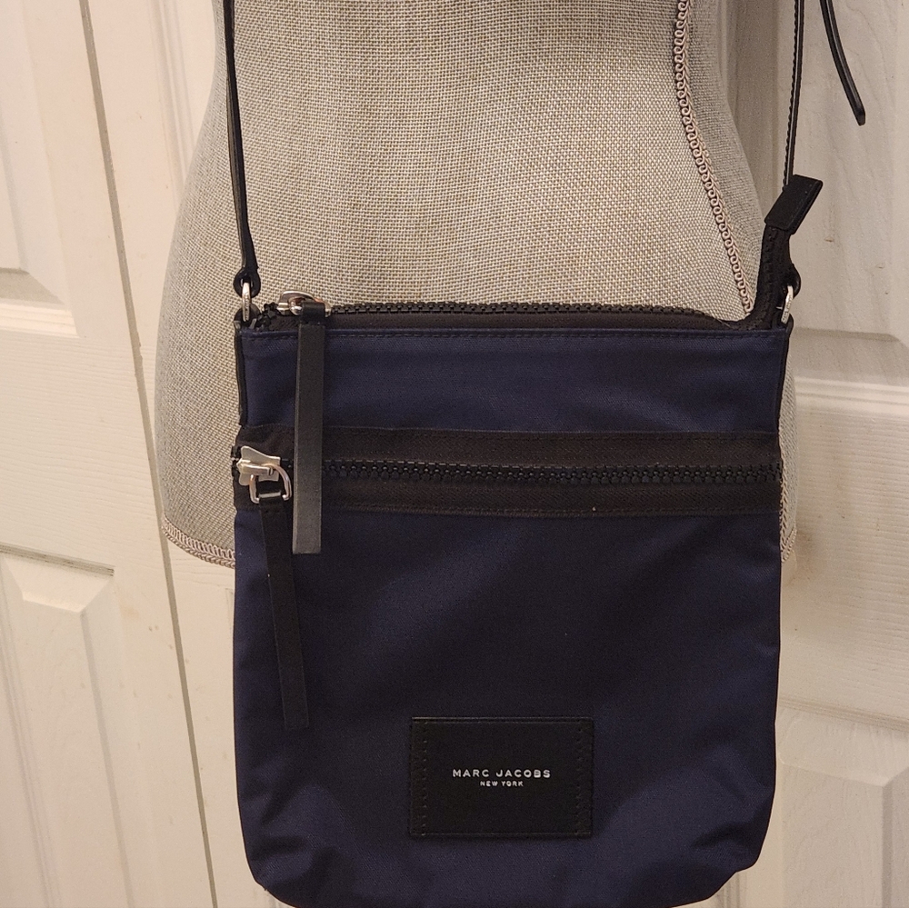Marc Jacobs Dark Blue Messenger Bag With Black Straps.